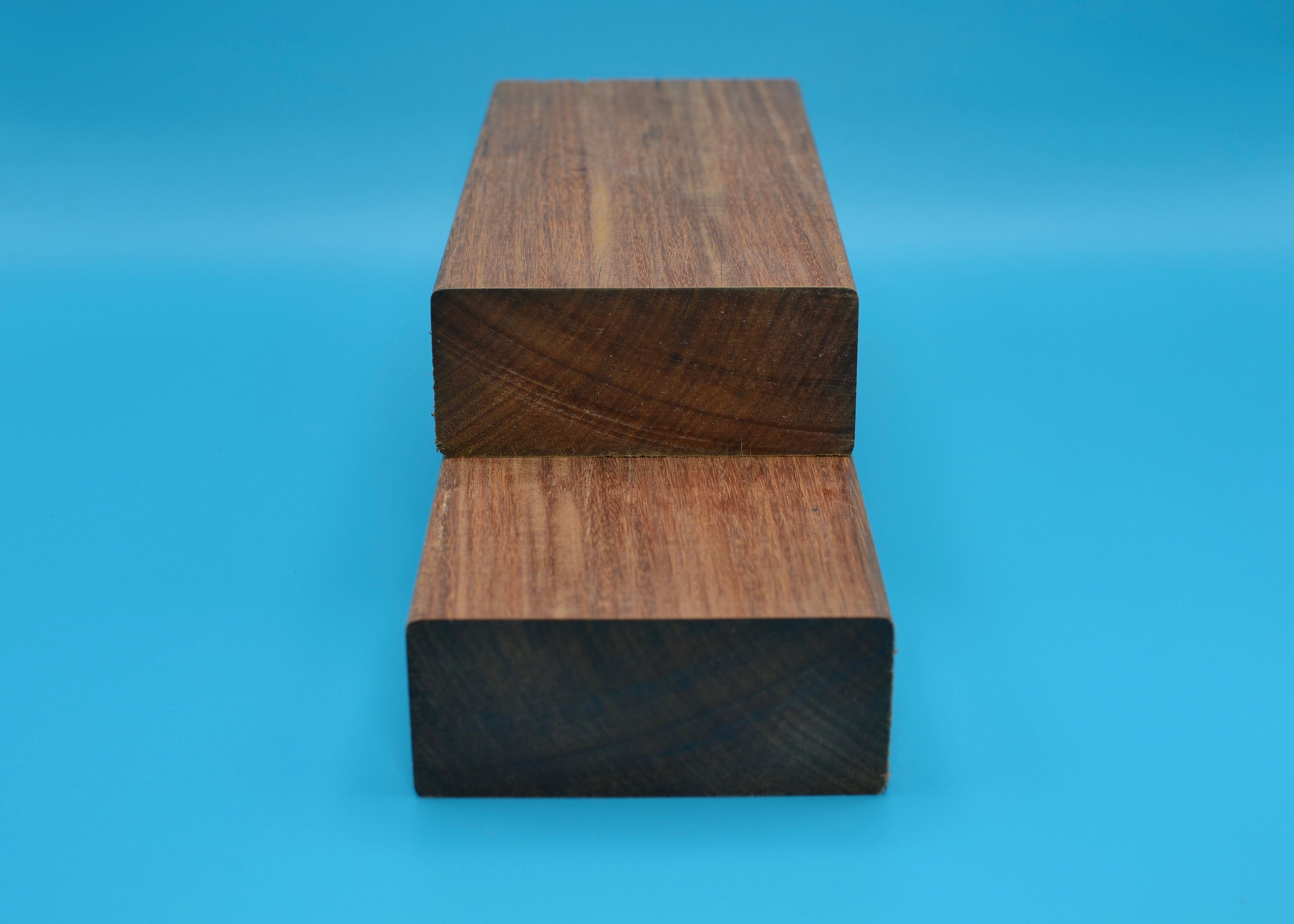 Ipe 2x4 E4E Wood on blue background