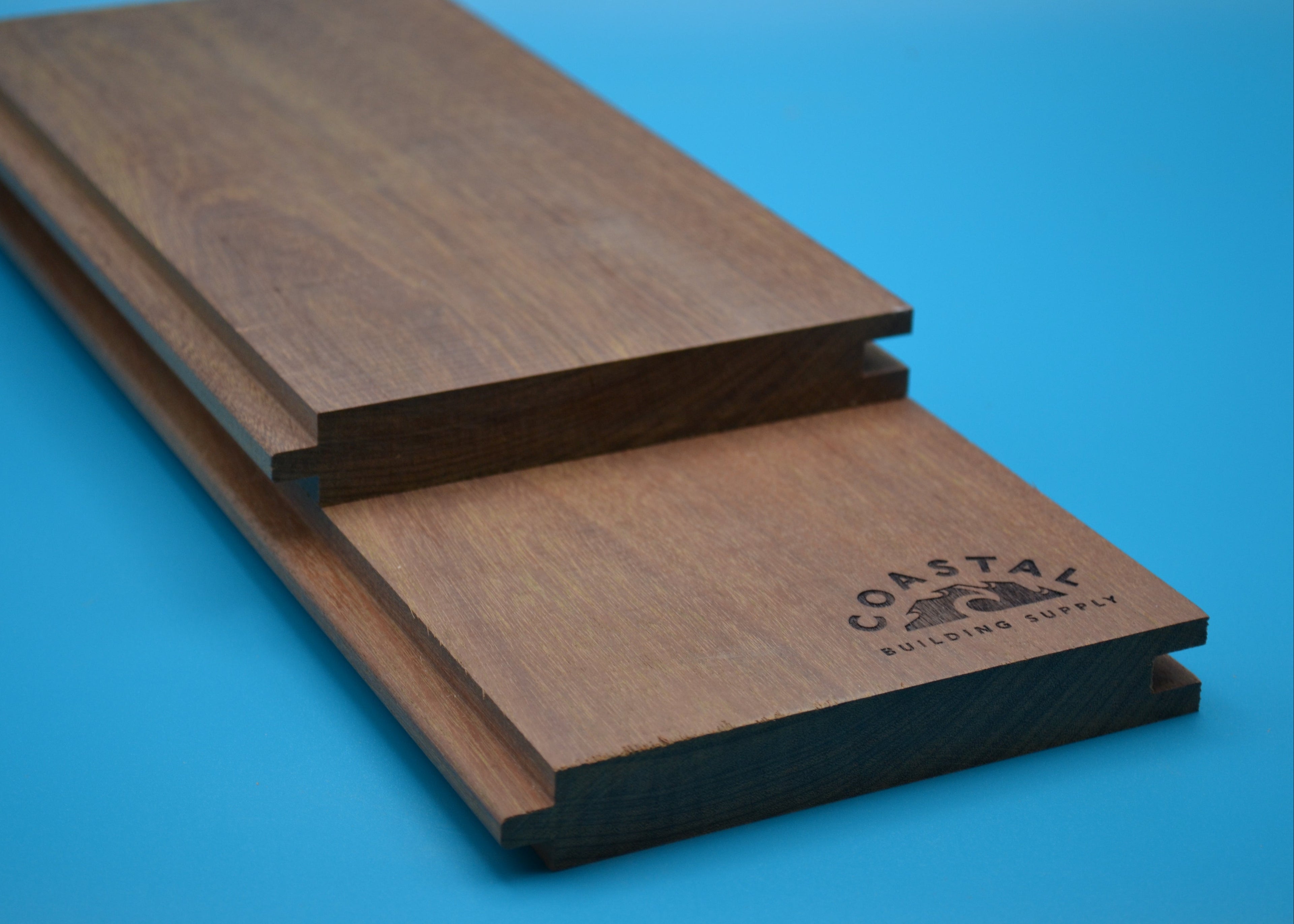 Ipe 1x6 T&G Flushgap Planks on blue background
