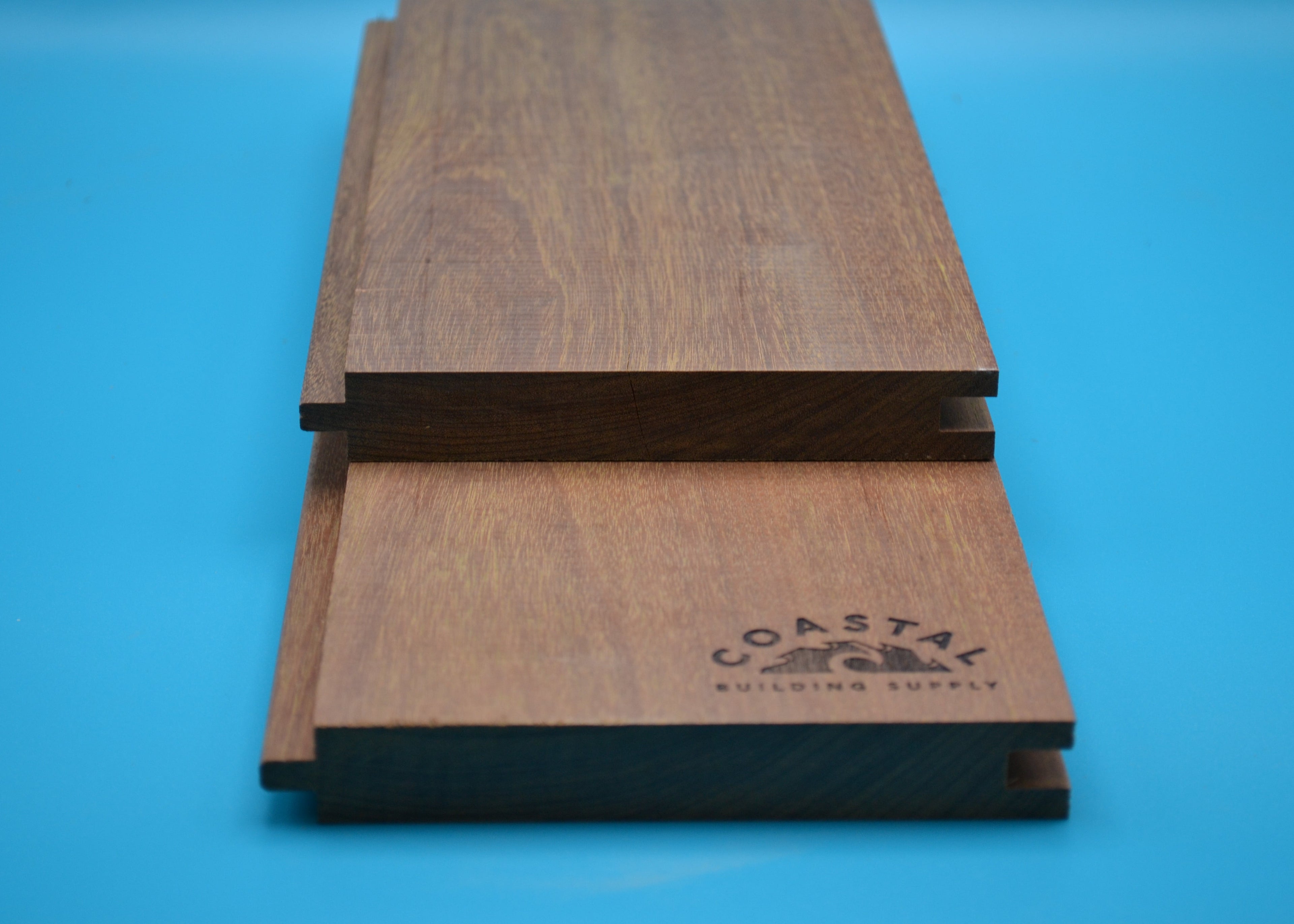 Ipe 1x6 T&G Flushgap Planks on blue background