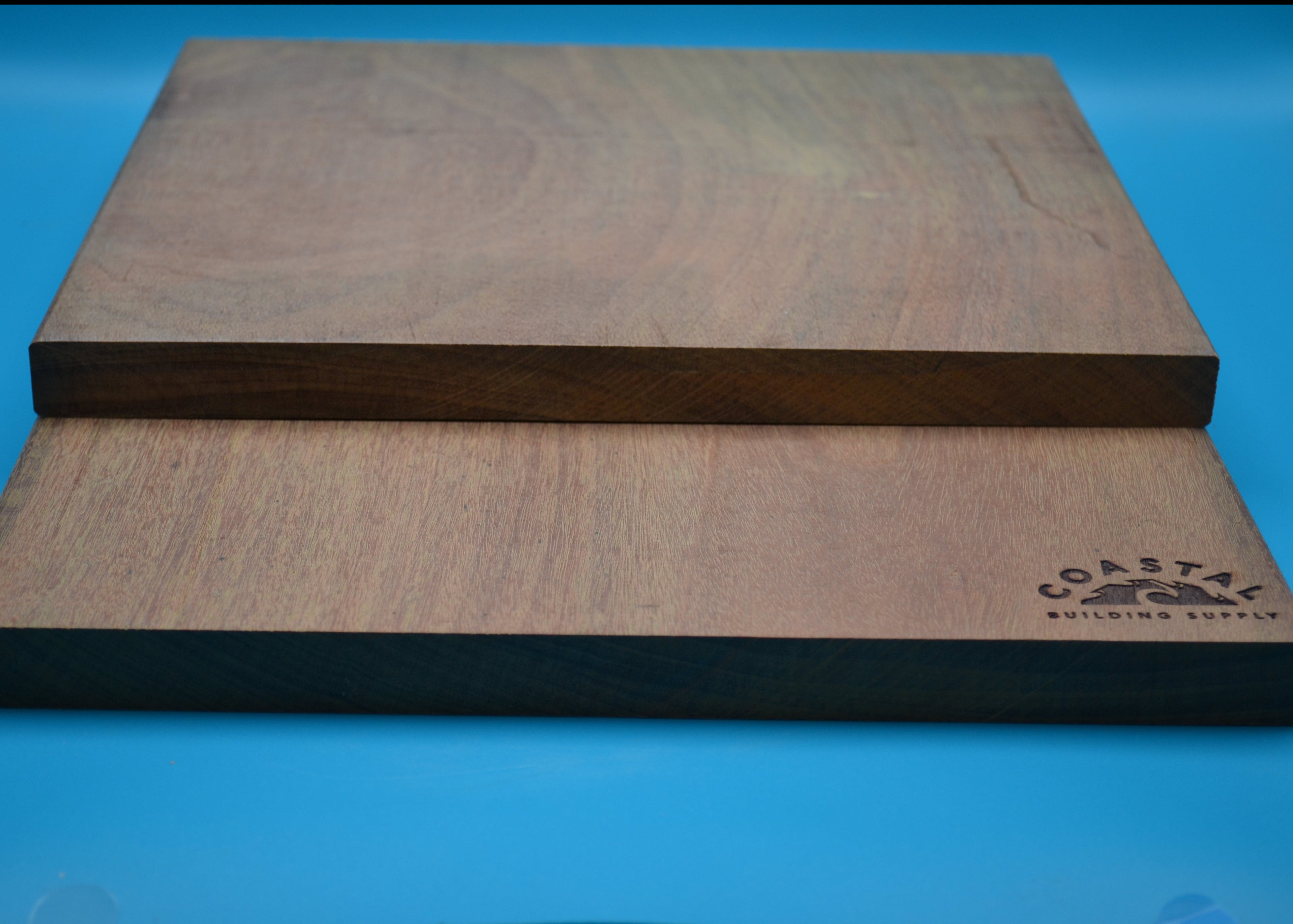 Ipe 1x12 E4E Decking Planks on blue background