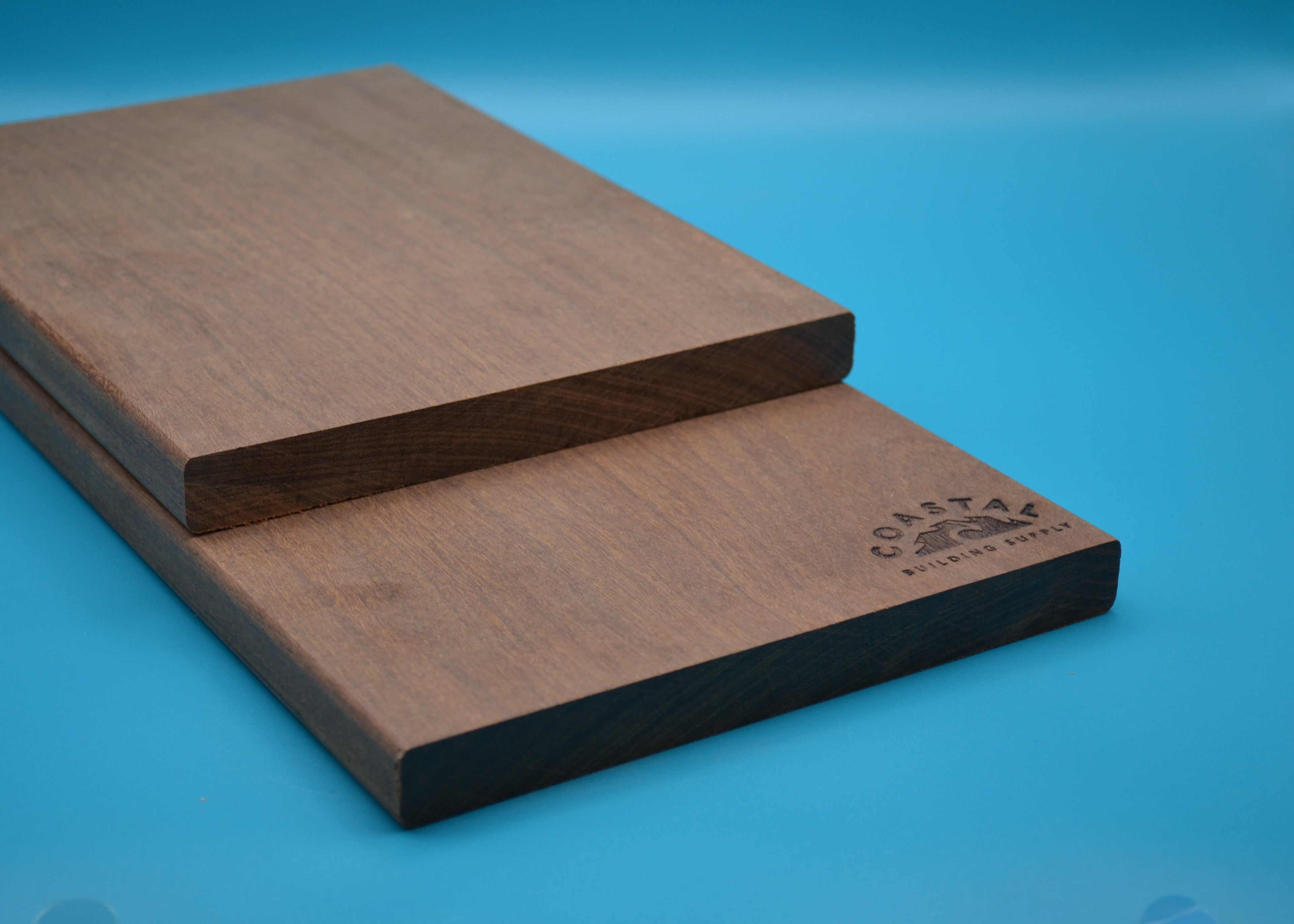 Ipe 1x8 E4E Decking Planks on blue background