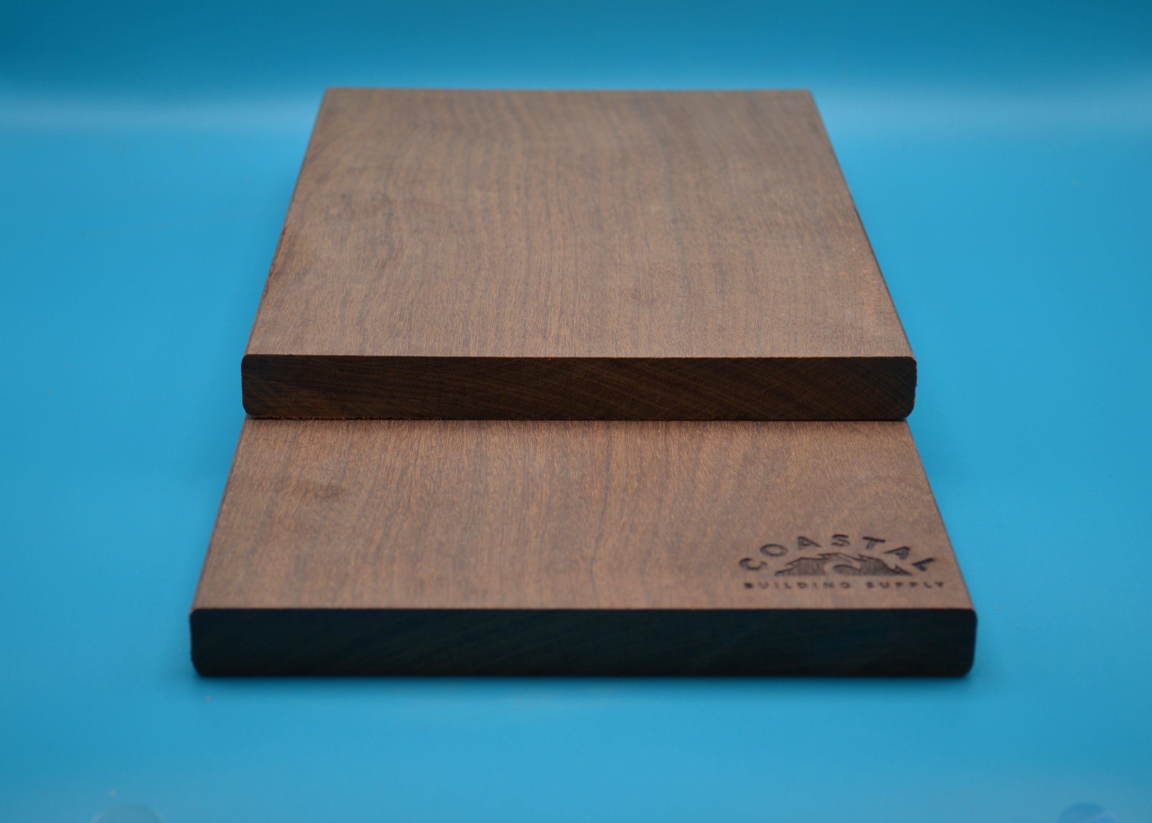 Ipe 1x8 E4E Decking Planks on blue background