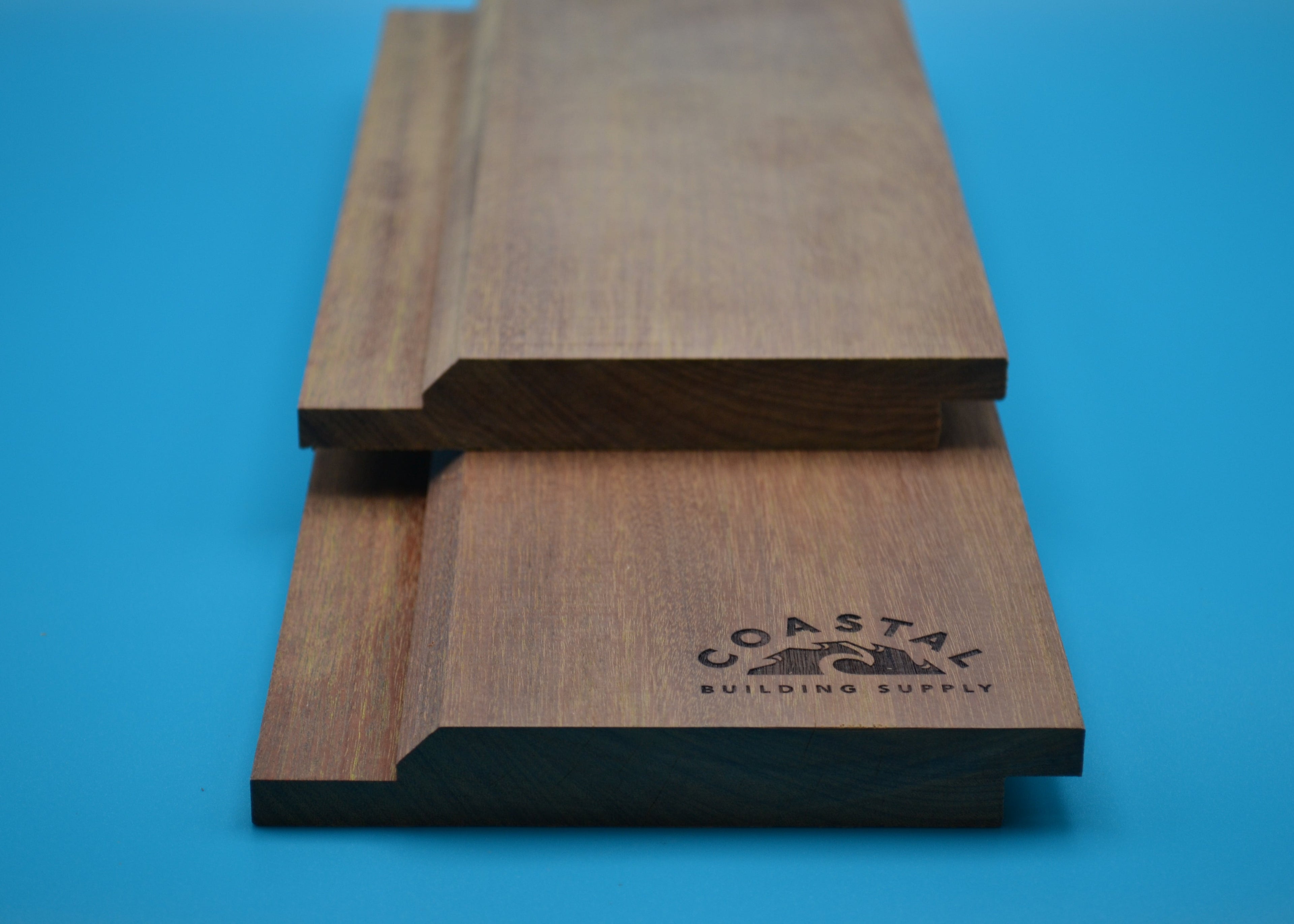 Ipe 1x6 K-Lap Planks on blue background