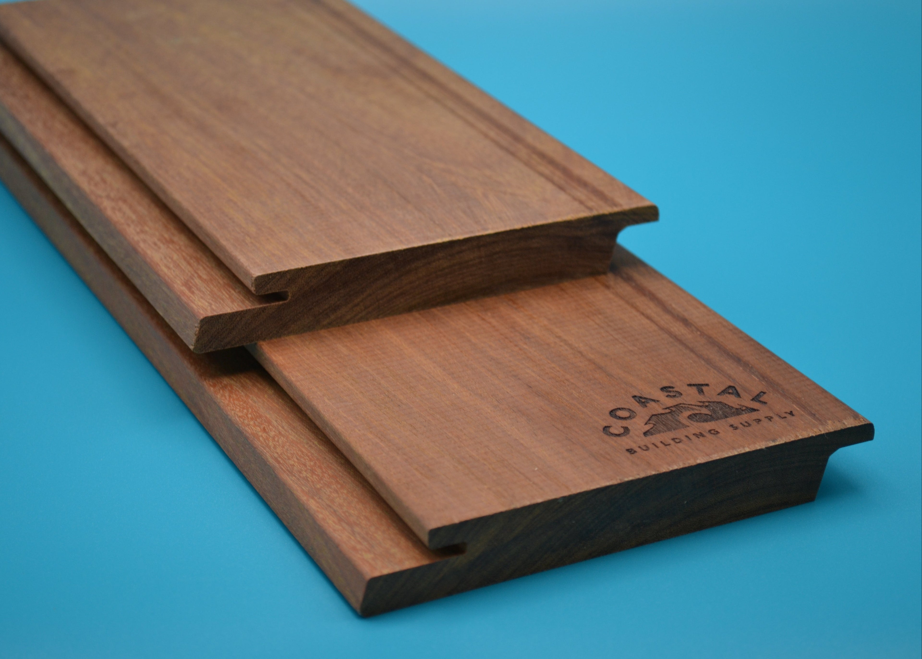 Ipe 1x6 Rainscreen planks on blue background