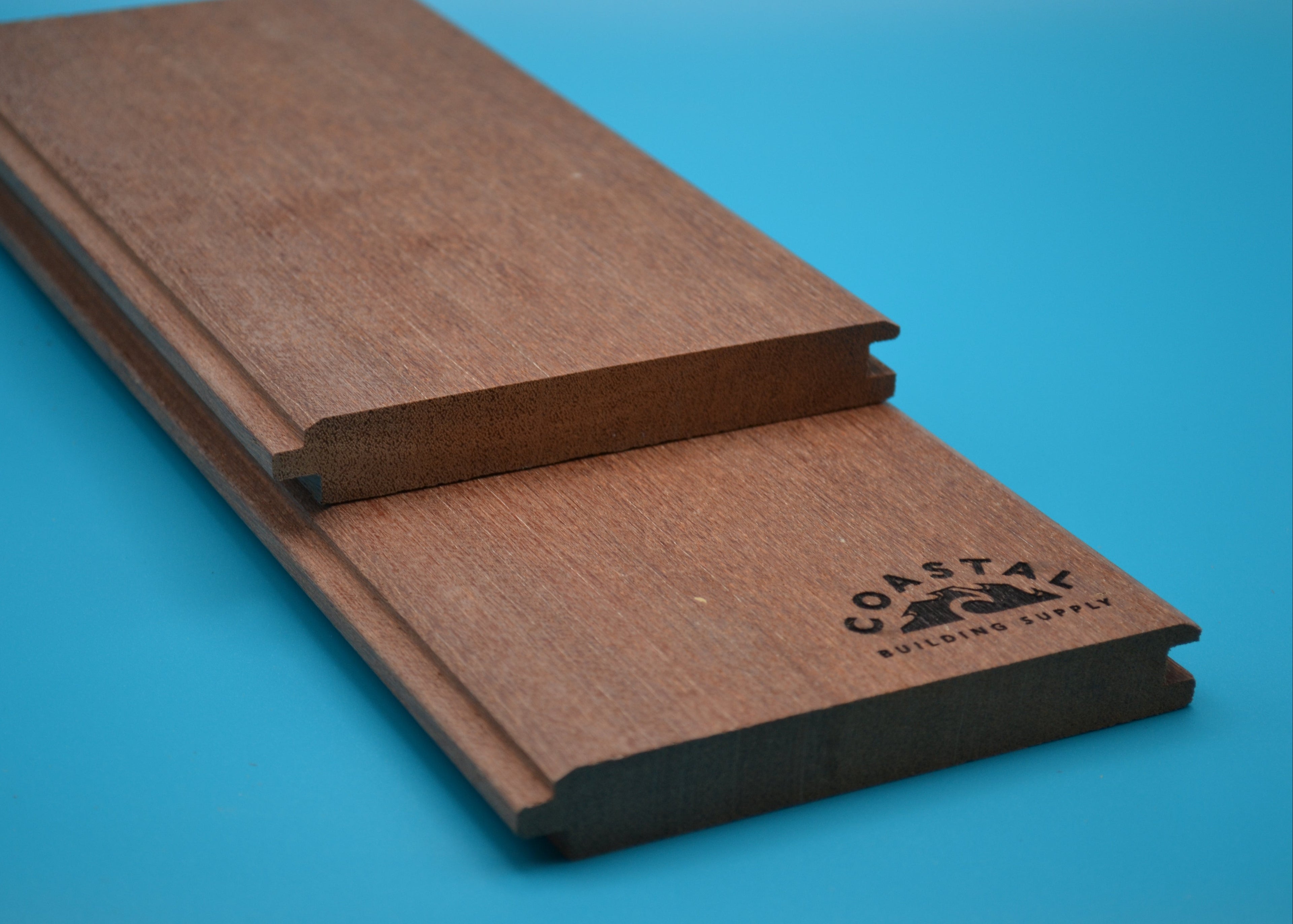 1 x 6 Mahogany Wood (T&G V-Groove/Shiplap) on a blue background