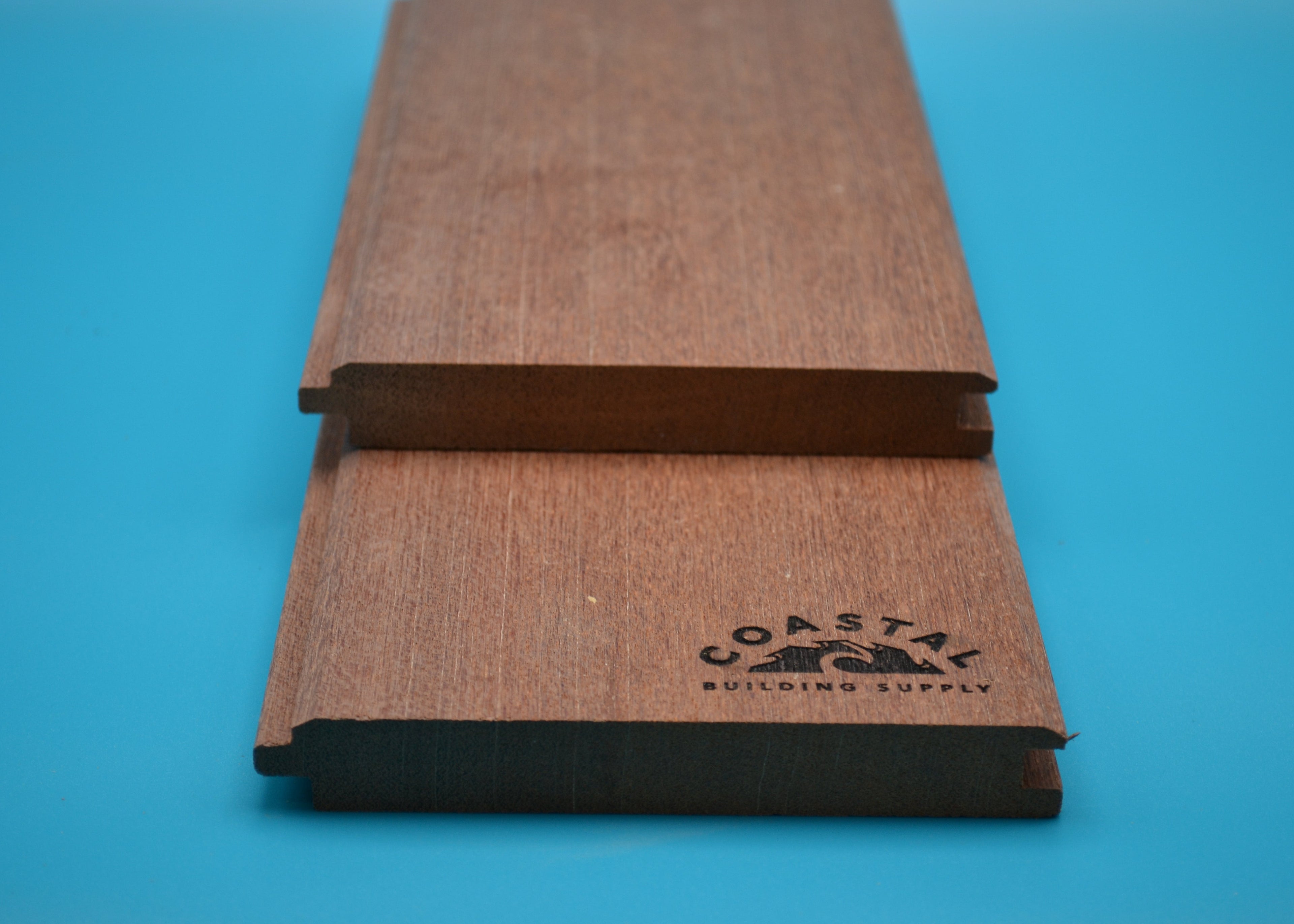 1 x 6 Mahogany Wood (T&G V-Groove/Shiplap) on a blue background