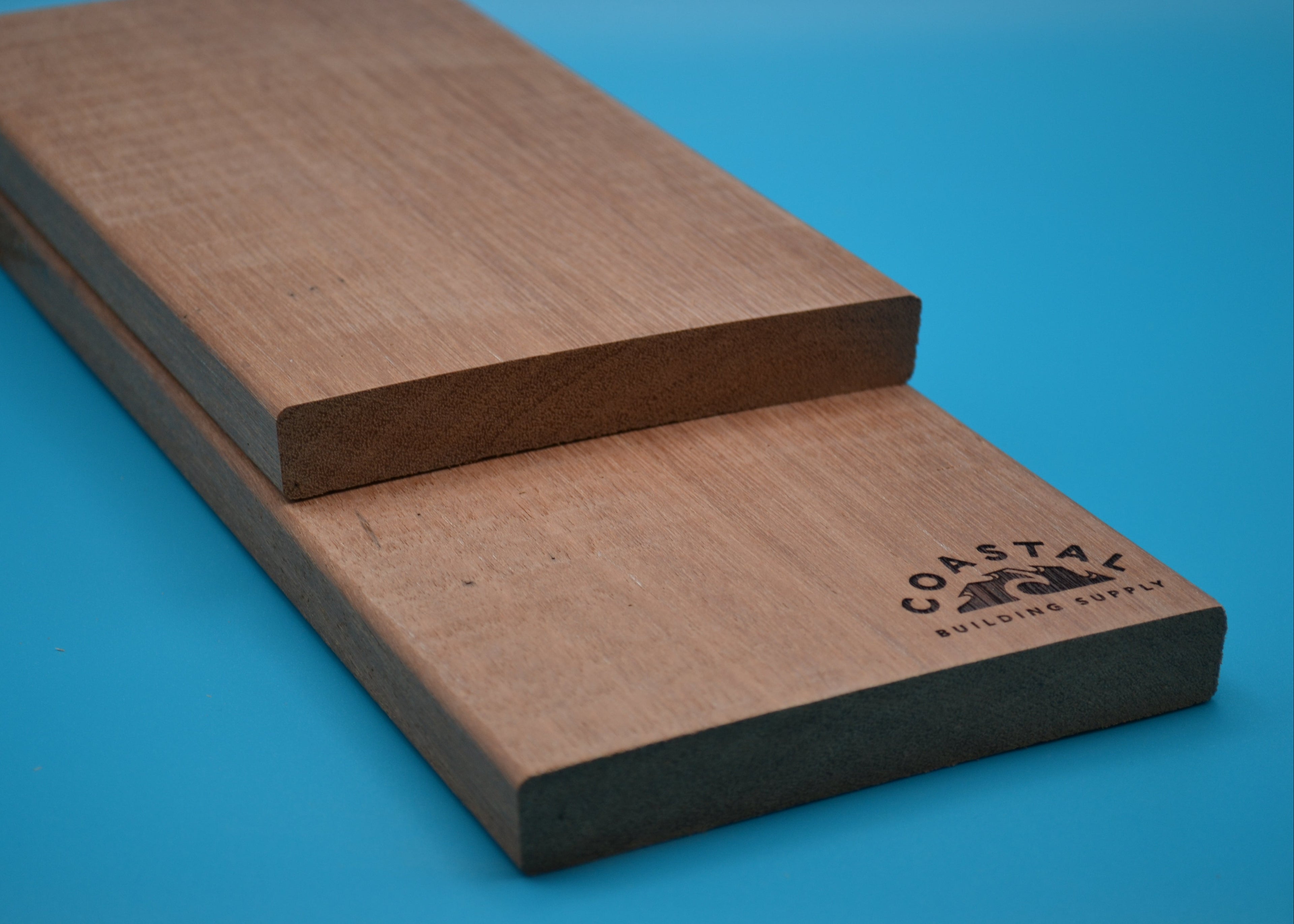 Red Balau 1x6 E4E Decking Planks on blue background