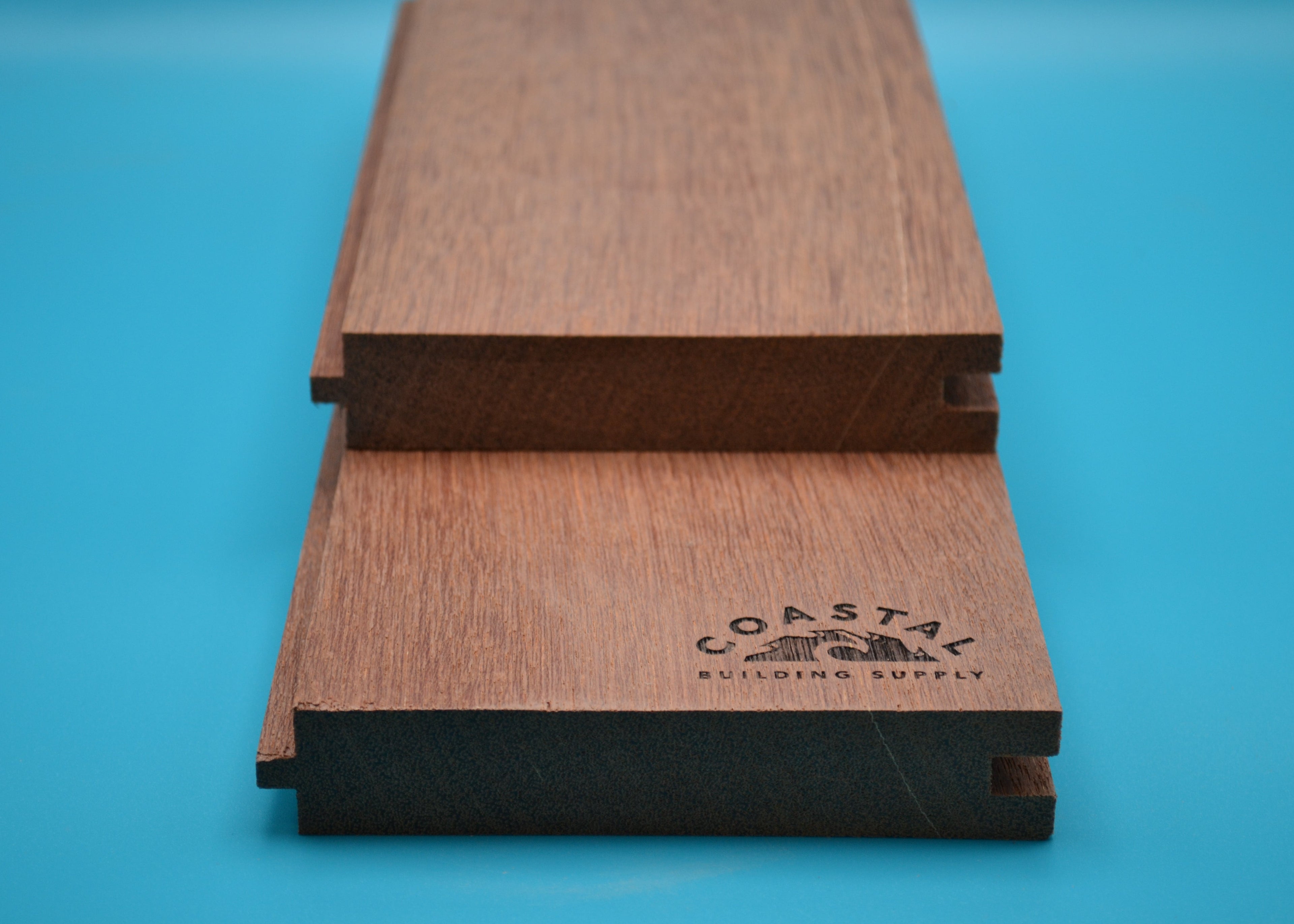 5/4 x 6 Red Balau Wood (T&G Flushgap) on a blue background