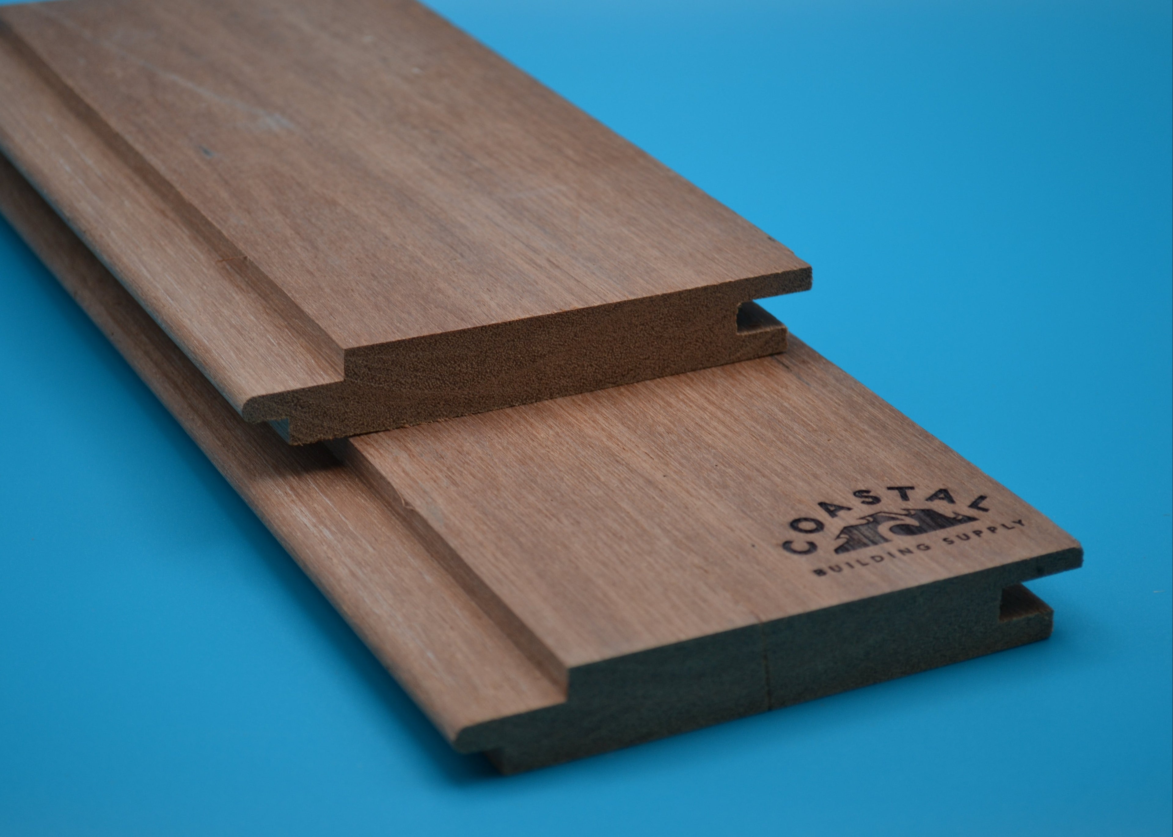 Red Balau 1x6 Hidden Nail T&G Planks on blue background