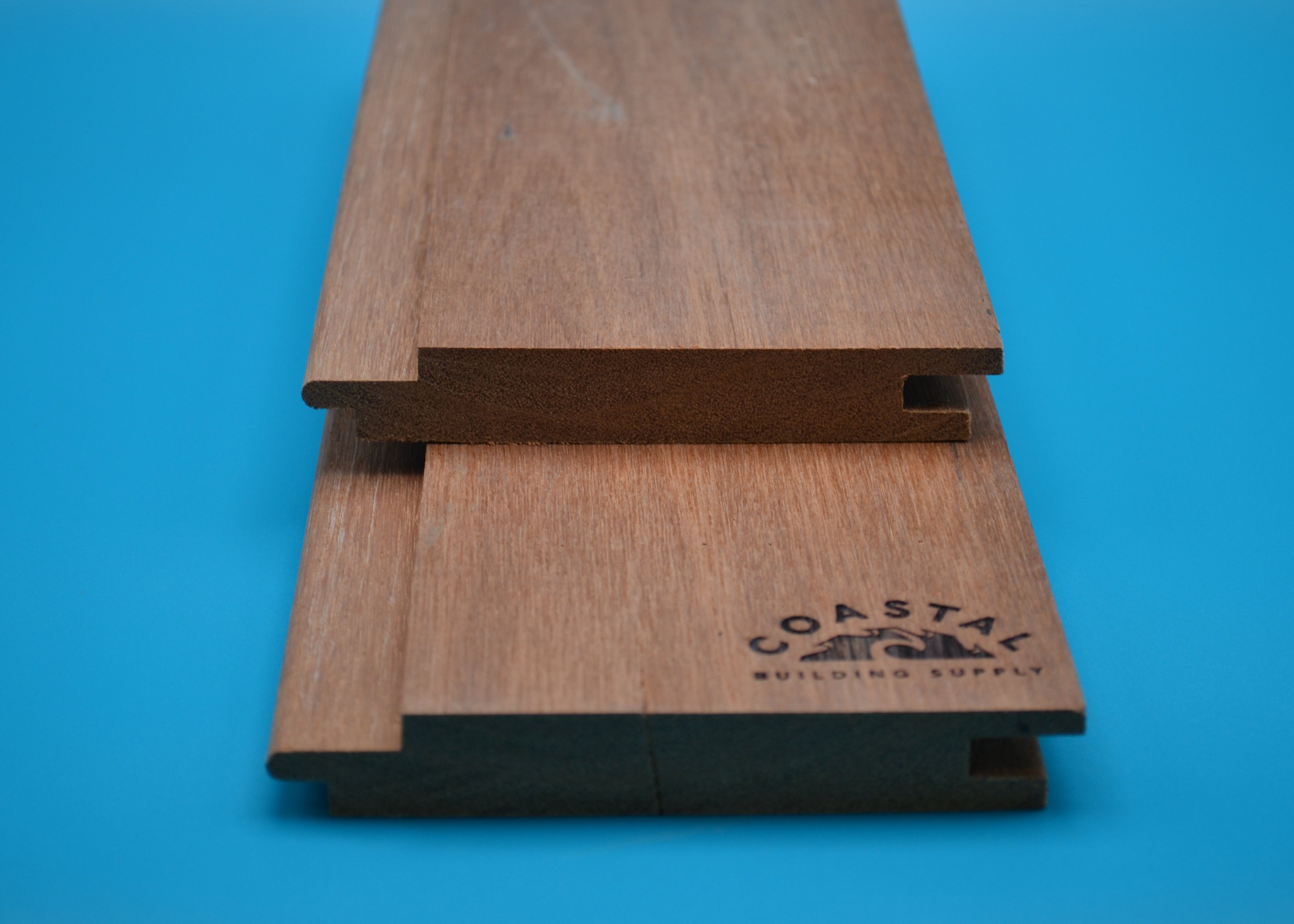 Red Balau 1x6 Hidden Nail T&G Planks on blue background