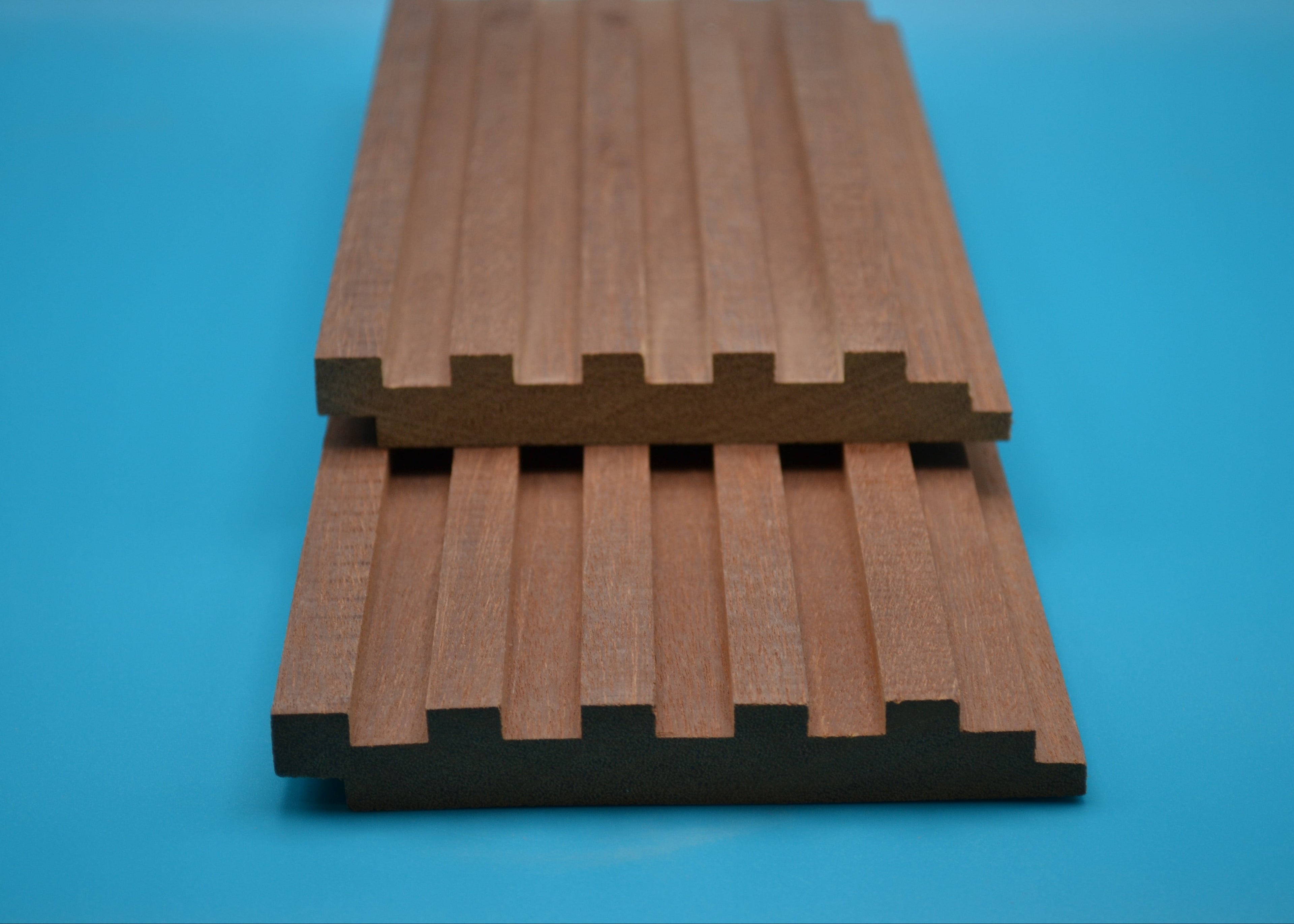 Red Balau 1x6 Piano Key Planks on blue background